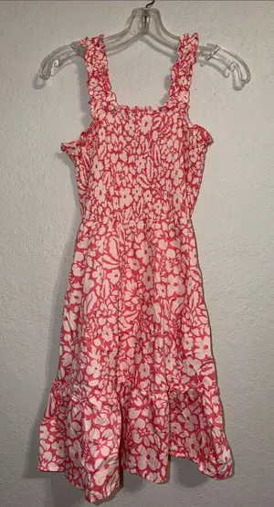 pink and white floral smocked sundress from the boutique brand Versona thumbnail 1