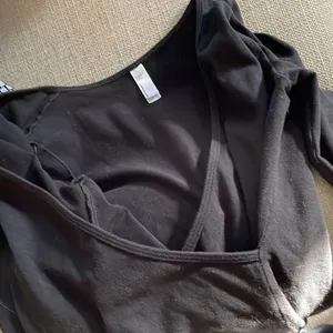 Stunning Black Long Sleeve Low Cut American Apparel Bodysuit thumbnail 4