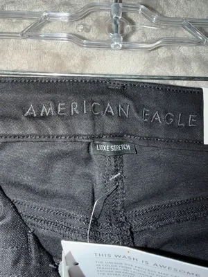 American Eagle Super Hi-Rise X4 Jegging Size 0 Black Ripped Jeans thumbnail 11