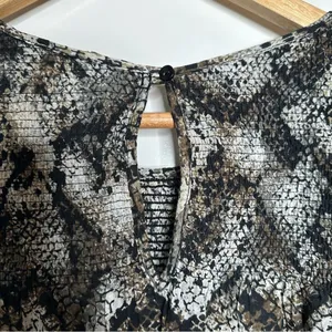 Free People NWOT Black Snakeskin XOXO Smocked Blouse Size Large thumbnail 9
