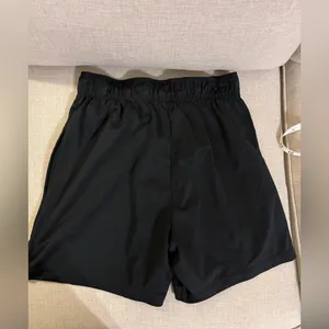 Nike women’s shorts with pockets. 4” Inseam. Black. thumbnail 3