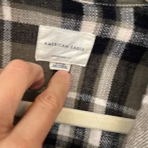 American Eagle distressed, button-down flannel size small thumbnail 2