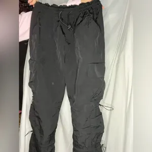 Like New The Chloe Nylon parachute pants by Garage size small in black, sold out thumbnail 4