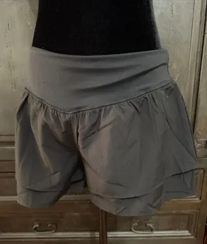 Black Athletic Flowy Activewear Workout Shorts - Size Medium. Gently warn and excellent condition. Under shorts with pockets. Measurements approximately 14” waste, not fully stretched out x 13.5” long. Non-smoking home. priced to sell at as is condition. Don’t like my price, make reasonable offer! And thank you for checking my closet. thumbnail 1