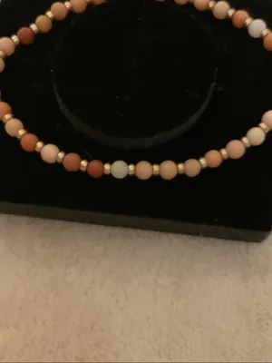 Neutral Multi-Bead Stretch Bracelet with Gold Cross Charm thumbnail 5