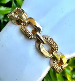 Gold tone link hinged bracelet thumbnail 1