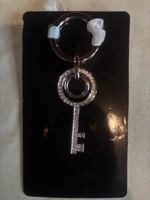 Silver key keychain thumbnail 1