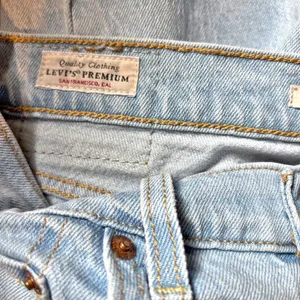Levi's Premium Ribcage Straight Ankle Light Wash Raw Hem Jeans - size 28 thumbnail 6