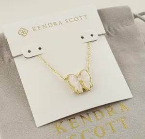 Kendra Scott white Haley Bow Gold Short Pendant Necklace thumbnail 1