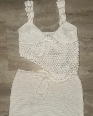 White crochet mini skirt set with textured openwork pattern from Amazon, size S thumbnail 1