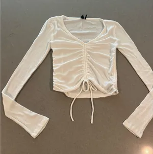 Out From Under White Ribbed Ruched Drawstring‎ V Neck Long Sleeve Cropped Top thumbnail 1