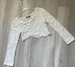 Urban Outfitters Lace Textured Asymmetrical Long Sleeve Crop Top White (Medium) thumbnail 1