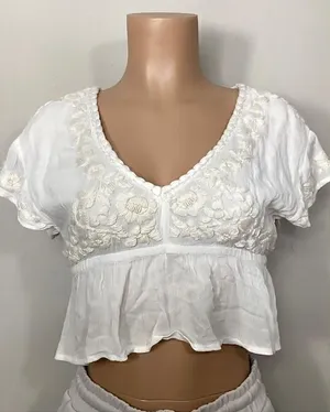 New. Anthropologie RAGA Sorrento Peplum Crop Top in White thumbnail 1