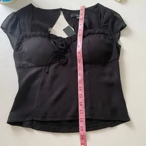 NWT Lulus Black Tie Front Blouse Size S Sheer Sleeve Romantic Top thumbnail 7