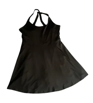 Black athletic dress with built-in shorts with side pockets and a sports bra. thumbnail 1