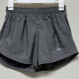 NWOT Nike DRI-FIT Women's Gray Running Gym Athletic Workout Shorts size S thumbnail 1