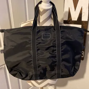 Vintage Pierre Cardin black canvas duffle bag thumbnail 1