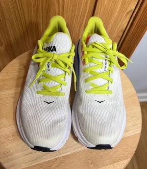 Hoka White Running Shoes with Neon Yellow Accents thumbnail 1