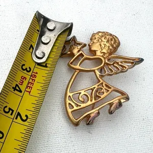 Gold tone angel holding star brooch thumbnail 3