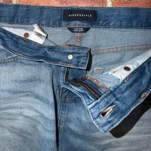 Pre-Owend Aeropostale Denim Low Rise Mini Skirt Blue Jean Y2K Size L Distressed thumbnail 3