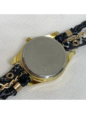 Geneva Women's Gold Toned black Wrap Around band watch 28mm up to 6.5” running thumbnail 6