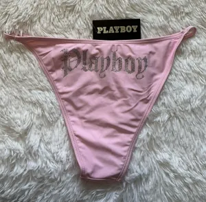 PLAYBOY Pink Rhinestone Logo Thong Swimsuit Bottoms thumbnail 1