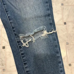 Women’s Distressed Mid-Rise Skinny Jeans thumbnail 3