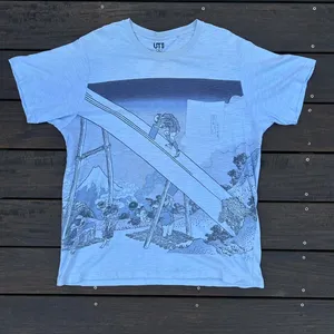 Light Blue Uniqlo Hokusai Mt Fuji Graphic Tee thumbnail 1