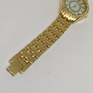 Women’s quartz analog gold tone wrist watch 28mm pearl dial 7”-7.5” running thumbnail 3