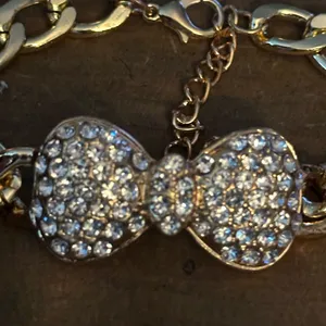 Gold tone pave bow tie bracelet, earrings and ring set thumbnail 7