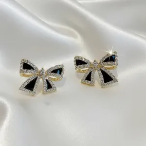 Black and Gold Bow Earrings thumbnail 2