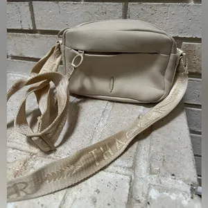 Anthropologie Thacker NYC Cocoon 3 in 1 Phone Bag Cream Neoprene Crossbody Purse thumbnail 1