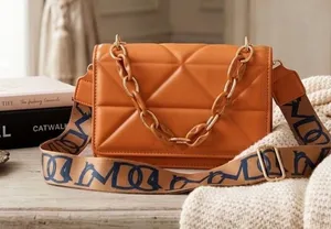 Quilted Faux-Leather Mini Shoulder Bag with Chain Detail thumbnail 1