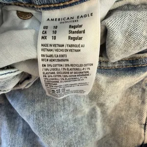 american Eagle wide leg light wash denim blue jeans 10 r Baggy Distress Skater thumbnail 5