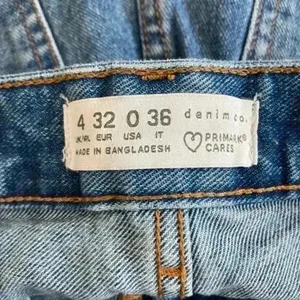 Primark high rise blue distressed jean shorts in size 0 thumbnail 3