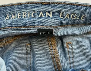 American Eagle Outfitters • Light Wash Destructed Mom Jeans thumbnail 4