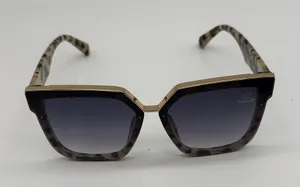 ISLANDR Sunglasses. Stylish Tan and black print with gold trim on the top. thumbnail 1