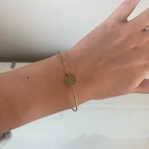 Delicate Gold-Tone Wire Bracelet with Coin Charm thumbnail 1