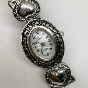 Collezio women silver tone watch 20mm oval hearts mop dial size 7” running thumbnail 2