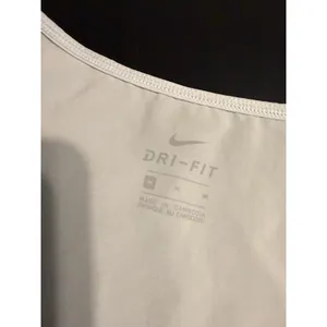 Nike Dri-FIT Womens Tank Top Medium Gray Perforated Swoosh High Low Hem Athletic thumbnail 5