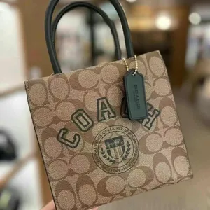 NWT Coach Mini Cally Crossbody In Signature Canvas With Varsity Motif cf381 thumbnail 1