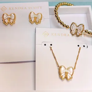 Kendra Scott Haley Bow Gold Pendant Earrings and Necklace thumbnail 7