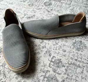 UGG's Silver Sparkle Slip on Shoe in Size 9.5 With Beige Trim thumbnail 1
