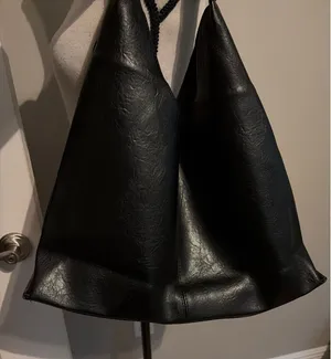 Black slouchy vegan leather shoulder bag with an unstructured, triangular hobo d thumbnail 1