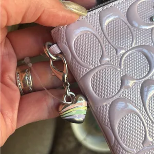 Authentic COACH patent signature leather zip top wristlet with a heart charm thumbnail 4
