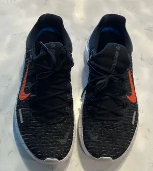 Black nike Athletic Shoes with orange, blue and purple back thumbnail 1