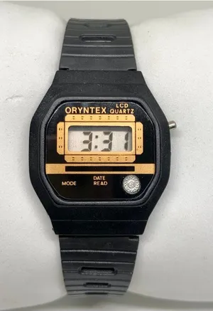 Vintage Oryntex Lcd quartz digital kids/women watch 26mm black tone running thumbnail 1