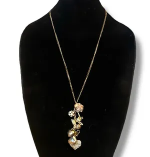 Gold tone love theme charm tassel necklace thumbnail 1