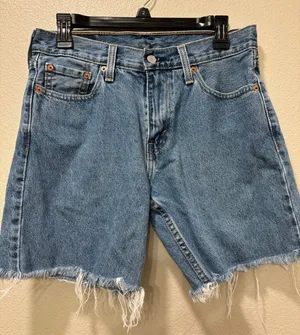 Levis Cutoff Shorts Womens 30 Medium Wash Denim Distressed Raw Hem 90s Concert thumbnail 1