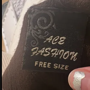 Brown Sleeveless Dress with Floral Embroidery thumbnail 2
